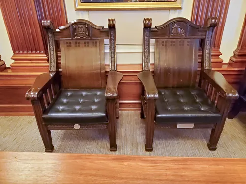 Carved heritage armchairs