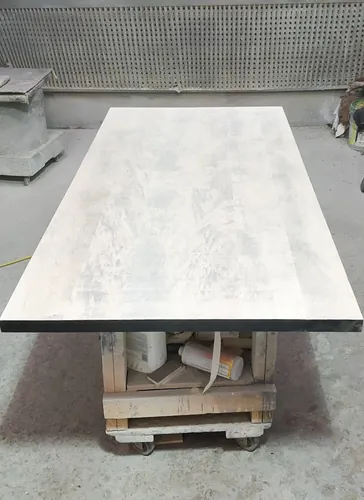 Table base refinished, stone top
